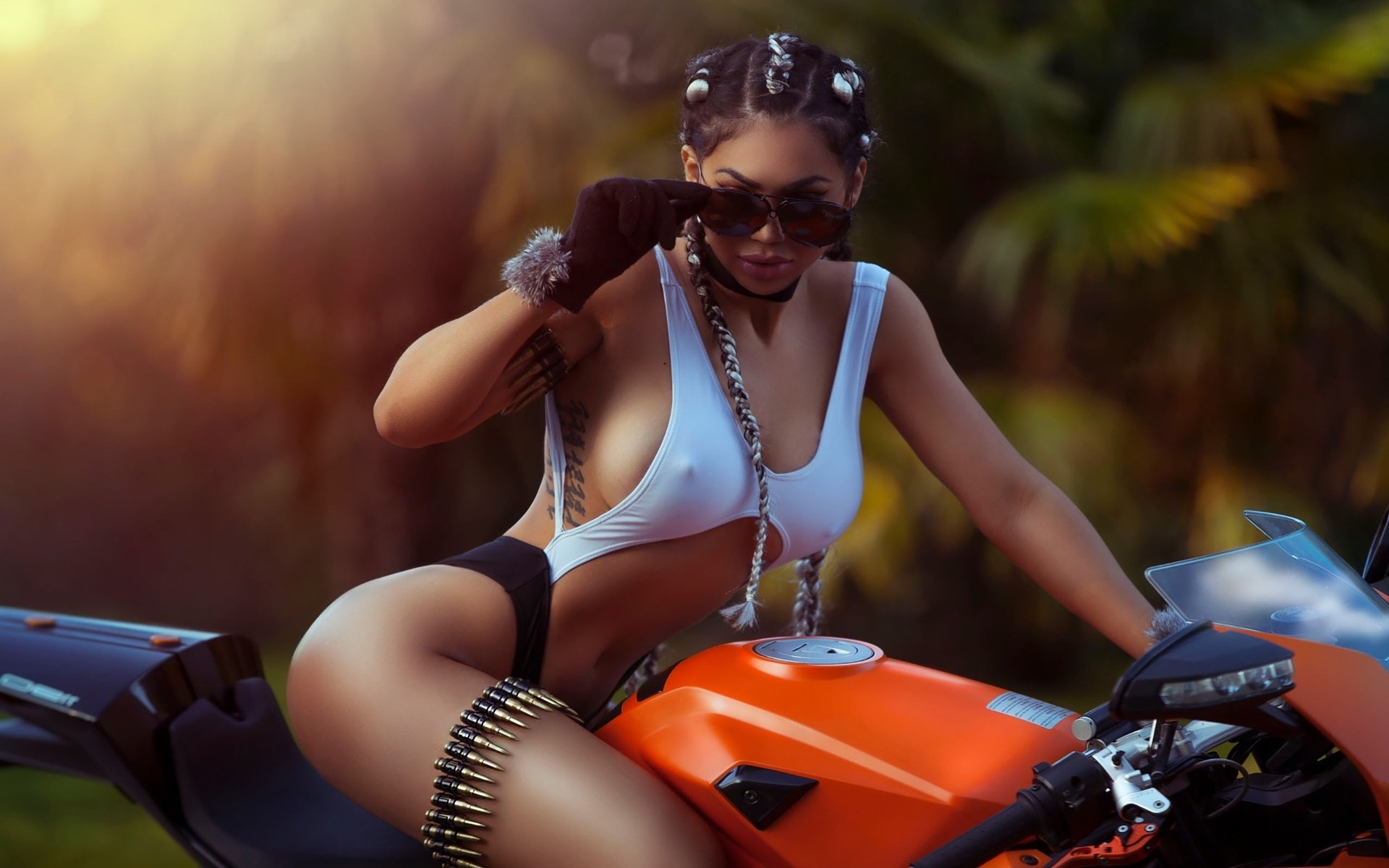 Girls with tattoos and motorcycles in Puducherry